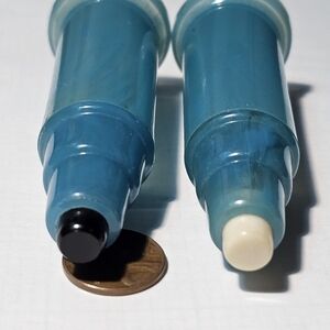 Vintage push button salt and pepper shakers